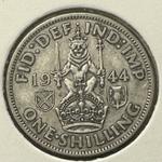 Gran Bretaña 1 chelín 1944 en subasta TMAJK sro - 28 de septiembre de 2023